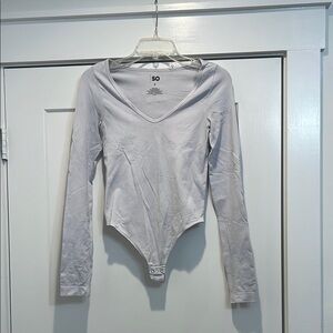 SO by Kohls light grey v-neck bodysuit size small. In good condition!